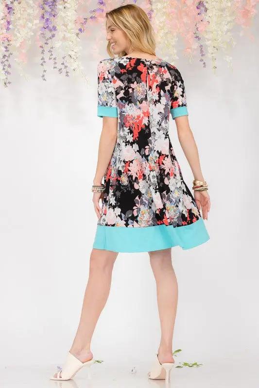 Celeste Full Size Floral Surplice Short Sleeve Dress with Pockets Plus Size