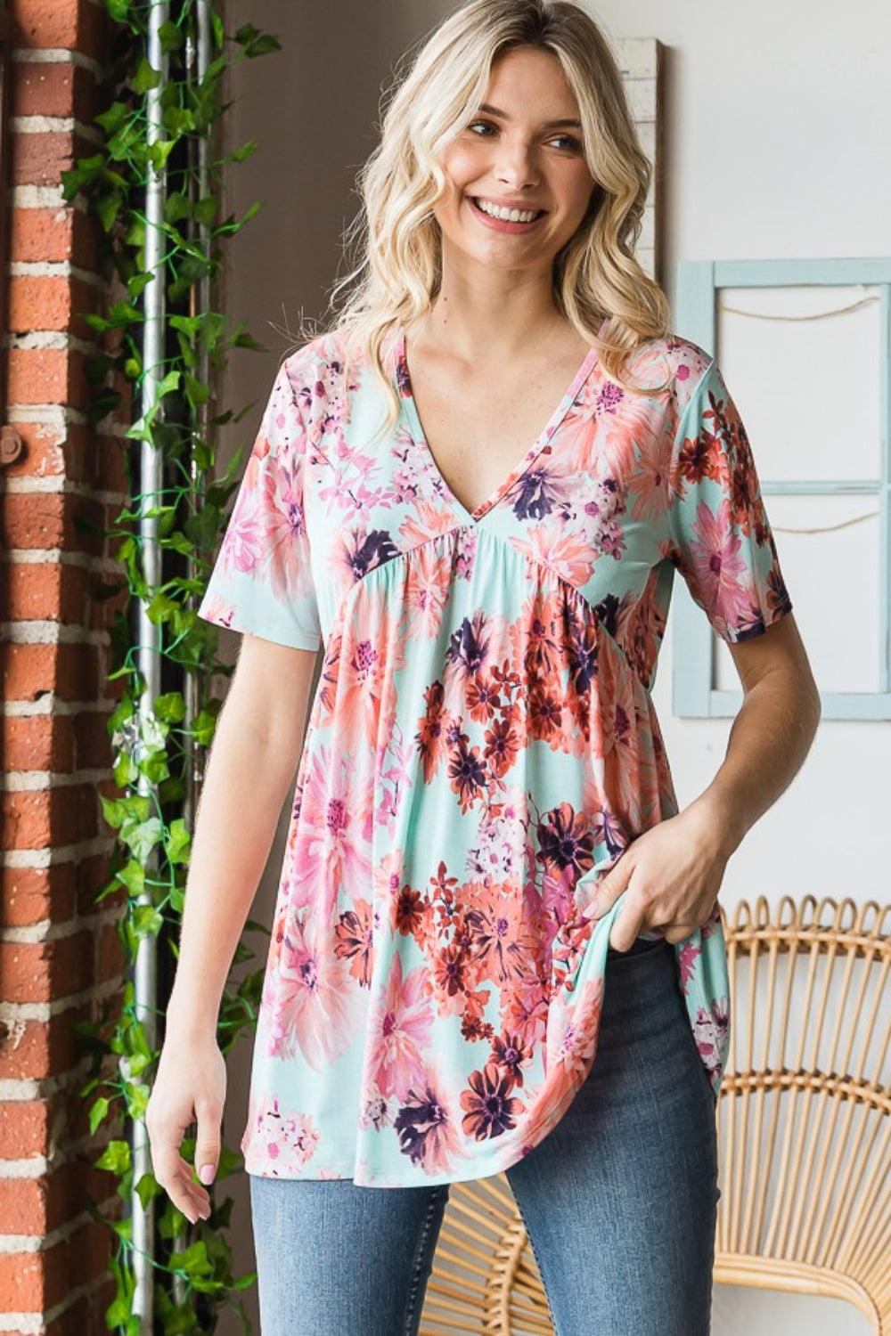 Heimish Full Size Floral V-Neck Short Sleeve Babydoll Blouse - AMIClubwear