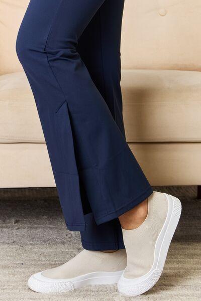 Kimberly C Full Size Wide Waistband Slit Flare Pants - AMIClubwear