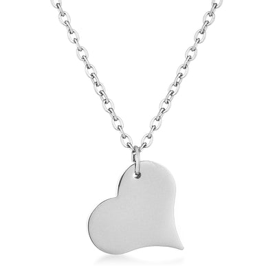 This enchanting necklace features a dainty heart dangling from a cable chain. The pendant and adjustable cable chain are plated in a silver tone - AMIClubwear